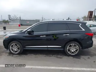 2013 Infiniti JX35 with VIN 5N1AL0MN7DC310972, listed as a IAAI auction lot 41859376 with 117,679 mi miles. Bid and sale history available at carsss.com. Image 14.