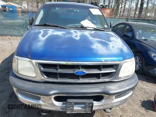 1997 Ford F-150 XL with VIN 1FTDX18W4VNB57679, listed as a IAAI auction lot 41918107 with 132,960 mi miles. Bid and sale history available at carsss.com. Image 6.
