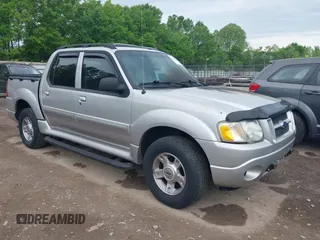 2004 Ford Explorer Sport Trac XLS z VIN 1FMDU77K74UA77223, wystawiony jako IAAI lot #42167996 z przebiegiem Nie podano mil oraz . Historia ofert i sprzedaży dostępna na DreamBid. Obrazek 1.