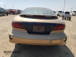 2000 Pontiac Sunfire SE z VIN 1G2JB1249Y7165024, wystawiony jako Copart lot #71418264 z przebiegiem Nie podano mil oraz Szkody całkowita. Historia ofert i sprzedaży dostępna na DreamBid. Obrazek 6.