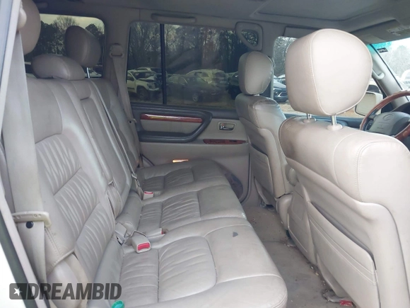 2000 Lexus LX 470 z VIN JT6HT00W9Y0103225, wystawiony jako IAAI lot #41148826 z przebiegiem 270 351 mil mil oraz . Historia ofert i sprzedaży dostępna na DreamBid. Obrazek 8.