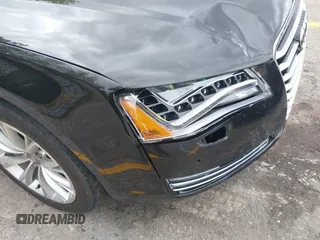2013 Audi A8 3.0L с VIN WAURGAFD8DN012938, выставлен на аукционе IAAI как лот 42334901 с пробегом 64 235 миль миль и . История ставок и продаж доступна на DreamBid. Изображение 6.