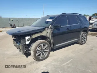 2023 Honda Pilot Touring with VIN 5FNYG2H7XPB013667, listed as a Copart auction lot 73353154 with 10,994 mi miles and Salvage Title. Bid and sale history available at carsss.com. Image 1.