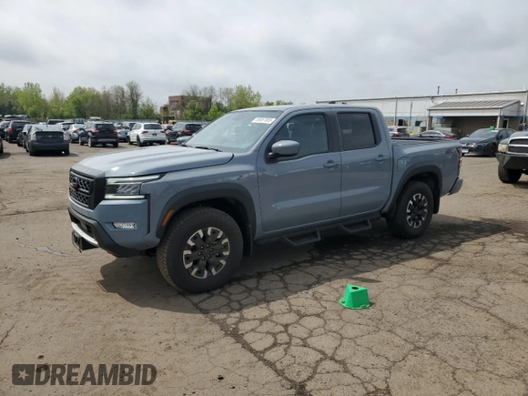 2023 Nissan Frontier Pro-4X with VIN 1N6ED1EK4PN672714, listed as a Copart auction lot 55557855 with 4,678 mi miles and Salvage title. Bid and sale history available at DreamBid. Image 1.