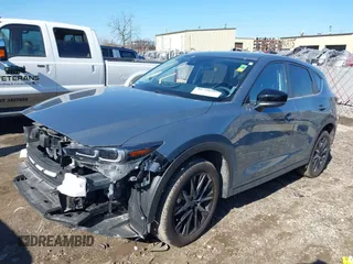 2023 Mazda CX-5 2.5 S Carbon Edition with VIN JM3KFBCM2P0277803, listed as a IAAI auction lot 41758982 with 15,745 mi miles. Bid and sale history available at carsss.com. Image 2.