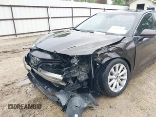 2020 Toyota Camry LE with VIN 4T1C11AK1LU320677, listed as a IAAI auction lot 41914421 with 94,291 mi miles. Bid and sale history available at carsss.com. Image 6.