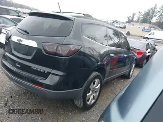 2013 Chevrolet Traverse LT with VIN 1GNKVJKD9DJ124307, listed as a IAAI auction lot 41864010 with 123,458 mi miles and . Bid and sale history available at DreamBid. Image 4.