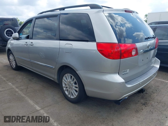 2009 Toyota Sienna XLE z VIN 5TDZK22C89S271855, wystawiony jako IAAI lot #42752540 z przebiegiem 168 909 mil mil oraz . Historia ofert i sprzedaży dostępna na DreamBid. Obrazek 3.