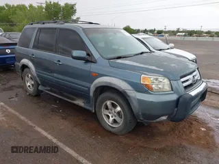 2007 Honda Pilot EX-L z VIN 2HKYF18677H501996, wystawiony jako IAAI lot #42374374 z przebiegiem 173 141 mil mil oraz . Historia ofert i sprzedaży dostępna na DreamBid. Obrazek 1.