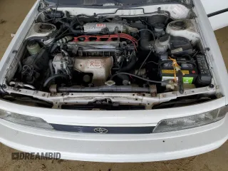 1991 Toyota Camry DLX z VIN 4T1SV21E1MU450315, wystawiony jako Copart lot #42772935 z przebiegiem 125 494 mil mil oraz Szkoda całkowita • Salvage title. Historia ofert i sprzedaży dostępna na DreamBid. Obrazek 11.