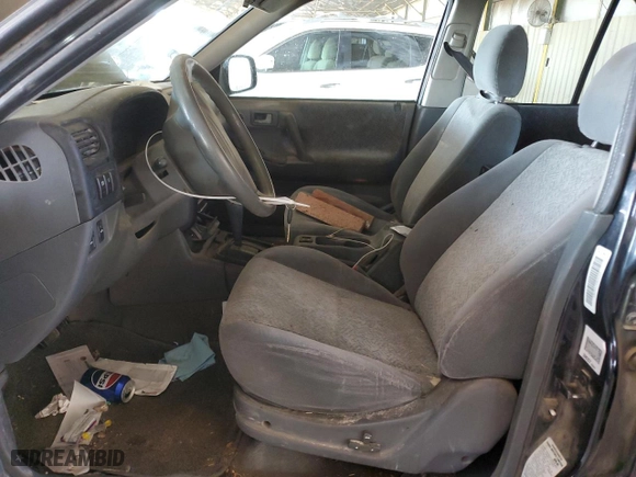 2001 Isuzu Rodeo S with VIN 4S2CK58W614344850, listed as a Copart auction lot 63807664 with 176,203 mi miles and Salvage Title. Bid and sale history available at carsss.com. Image 7.