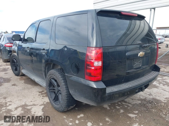 2011 Chevrolet Tahoe Commercial with VIN 1GNLC2E00BR325388, listed as a IAAI auction lot 41472731 with 265,781 mi miles and . Bid and sale history available at DreamBid. Image 3.