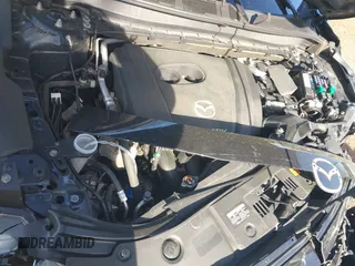2019 Mazda CX-5 Touring with VIN JM3KFBCM6K0513037, listed as a IAAI auction lot 42121789 with 59,455 mi miles and . Bid and sale history available at DreamBid. Image 10.