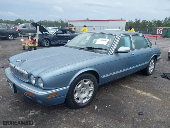 2002 Jaguar XJ VDP with VIN SAJDA24C32LF45422, listed as a IAAI auction lot 41654187 with 64,726 mi miles. Bid and sale history available at carsss.com. Image 2.