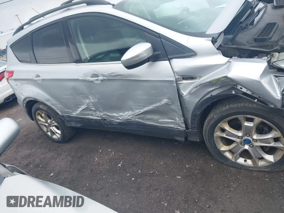 2013 Ford Escape SE with VIN 1FMCU0GX5DUA51847, listed as a IAAI auction lot 41897727 with 115,721 mi miles and . Bid and sale history available at DreamBid. Image 6.
