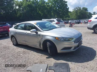 2017 Ford Fusion Hybrid SE z VIN 3FA6P0LU1HR243919, wystawiony jako IAAI lot #42644258 z przebiegiem 70 827 mil mil oraz . Historia ofert i sprzedaży dostępna na DreamBid. Obrazek 1.