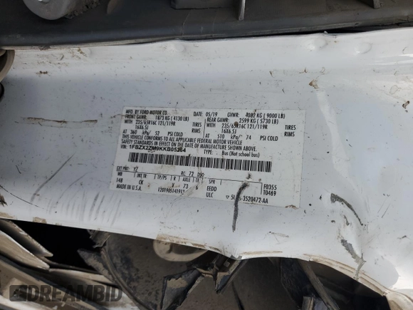 2019 Ford Transit Passenger XL z VIN 1FBZX2ZM9KKB05264, wystawiony jako Copart lot #78943974 z przebiegiem Nie podano mil oraz Szkody całkowita. Historia ofert i sprzedaży dostępna na DreamBid. Obrazek 13.