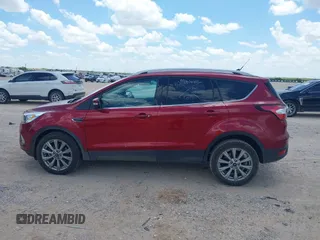 2018 Ford Escape Titanium with VIN 1FMCU0J96JUD58854, listed as a IAAI auction lot 42590609 with 77,825 mi miles and . Bid and sale history available at DreamBid. Image 14.