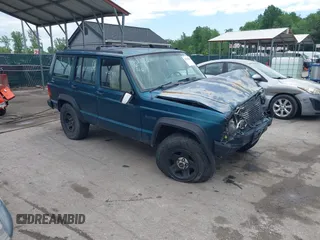 1996 Jeep Cherokee SE z VIN 1J4FJ28S8TL285634, wystawiony jako IAAI lot #42183816 z przebiegiem 260 237 mil mil oraz . Historia ofert i sprzedaży dostępna na DreamBid. Obrazek 1.