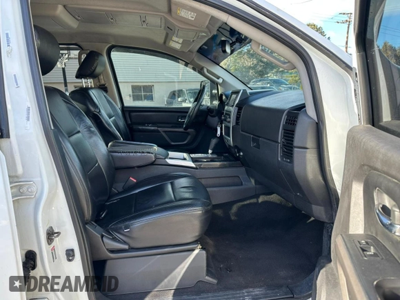 2015 Nissan Titan SL with VIN 1N6BA0EC7FN509763, listed as a Copart auction lot 88064785 with 168,916 mi miles and Clean Title. Bid and sale history available at carsss.com. Image 7.