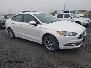 2017 Ford Fusion SE z VIN 3FA6P0H71HR201799, wystawiony jako IAAI lot #41346018 z przebiegiem 51 126 mil mil oraz . Historia ofert i sprzedaży dostępna na DreamBid. Obrazek 1.