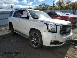 2015 GMC Yukon SLT with VIN 1GKS2BKC3FR143491, listed as a Copart auction lot 76062044 with Not Provided miles and Salvage Title. Bid and sale history available at carsss.com. Image 4.