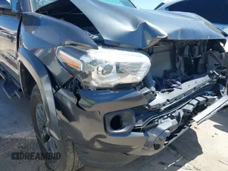 2023 Toyota Tacoma SR5 z VIN 3TMAZ5CN8PM201702, wystawiony jako IAAI lot #42060855 z przebiegiem 17 705 mil mil oraz . Historia ofert i sprzedaży dostępna na DreamBid. Obrazek 20.