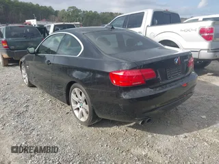 2011 BMW 3 Series 328i xDrive with VIN WBAKF5C52BE586375, listed as a IAAI auction lot 41799526 with 175,314 mi miles. Bid and sale history available at carsss.com. Image 3.