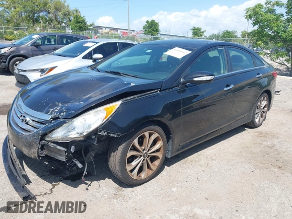 2014 Hyundai Sonata Limited with VIN 5NPEC4AB3EH841311, listed as a IAAI auction lot 42010642 with 148,558 mi miles and . Bid and sale history available at DreamBid. Image 2.
