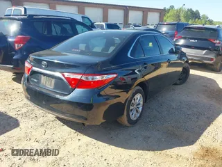 2016 Toyota Camry XLE with VIN 4T4BF1FK0GR553970, listed as a IAAI auction lot 41981657 with 224,806 mi miles and . Bid and sale history available at DreamBid. Image 4.