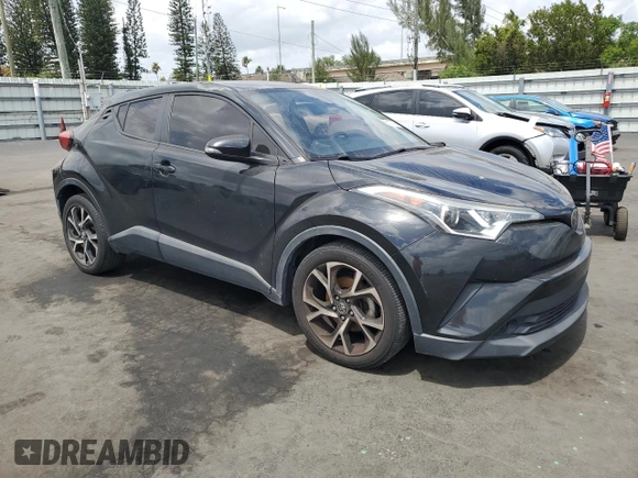 2018 Toyota C-HR XLE with VIN NMTKHMBX1JR015428, listed as a Copart auction lot 51111425 with 95,500 mi miles and Salvage Title. Bid and sale history available at carsss.com. Image 4.