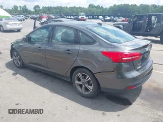 2018 Ford Focus SE with VIN 1FADP3FE2JL263954, listed as a IAAI auction lot 42480748 with 111,059 mi miles and . Bid and sale history available at DreamBid. Image 3.