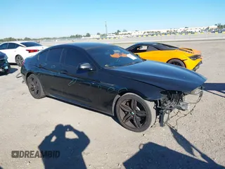 2015 BMW 6 Series 640i xDrive with VIN WBA6B8C55FD453166, listed as a IAAI auction lot 41296865 with 103,816 mi miles and . Bid and sale history available at carsss.com. Image 1.