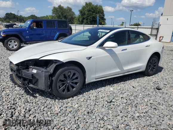 2018 Tesla Model S 75D with VIN 5YJSA1E26JF292682, listed as a Copart auction lot 62767065 with 101,433 mi miles and Salvage title. Bid and sale history available at DreamBid. Image 1.