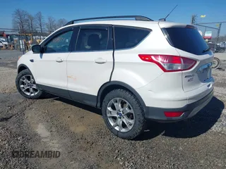 2013 Ford Escape SEL with VIN 1FMCU9HX1DUB37918, listed as a IAAI auction lot 41644931 with 153,726 mi miles and . Bid and sale history available at DreamBid. Image 3.