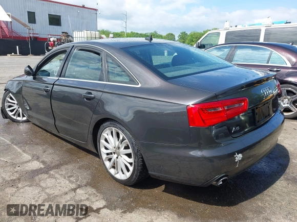 2013 Audi A6 Premium Plus with VIN WAUGFAFC2DN080928, listed as a IAAI auction lot 42141031 with 162,045 mi miles and . Bid and sale history available at DreamBid. Image 3.