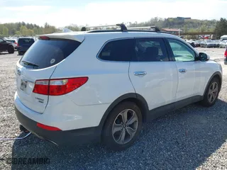 2014 Hyundai Santa Fe Limited with VIN KM8SNDHF5EU056294, listed as a IAAI auction lot 42042294 with 161,221 mi miles. Bid and sale history available at carsss.com. Image 4.