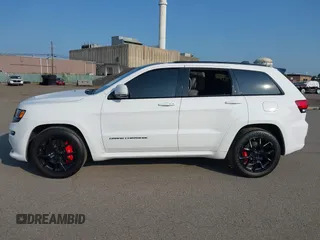 2016 Jeep Grand Cherokee SRT with VIN 1C4RJFDJ3GC503878, listed as a IAAI auction lot 42830257 with 82,661 mi miles and . Bid and sale history available at DreamBid. Image 14.
