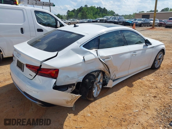 2023 Audi A5 Sportback Premium z VIN WAUABCF57PA020461, wystawiony jako IAAI lot #42230307 z przebiegiem 28 983 mil mil oraz . Historia ofert i sprzedaży dostępna na DreamBid. Obrazek 4.