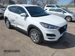 2019 Hyundai Tucson SE with VIN KM8J2CA43KU870933, listed as a IAAI auction lot 41972884 with 53,029 mi miles. Bid and sale history available at carsss.com. Image 1.