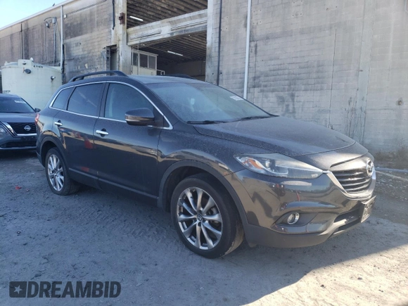 2014 Mazda CX-9 Grand Touring with VIN JM3TB3DV2E0440878, listed as a Copart auction lot 45679405 with 103,652 mi miles and Clean Title. Bid and sale history available at DreamBid. Image 4.