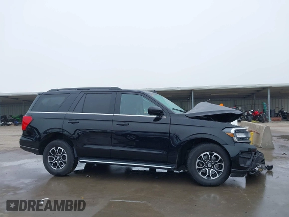2023 Ford Expedition XLT with VIN 1FMJU1H86PEA14891, listed as a IAAI auction lot 41514898 with 56,592 mi miles. Bid and sale history available at carsss.com. Image 14.
