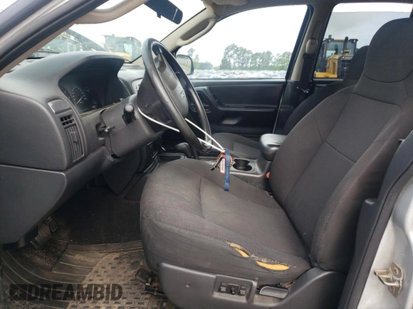 2004 Jeep Grand Cherokee Laredo z VIN 1J4GW48S14C288605, wystawiony jako Copart lot #60204815 z przebiegiem 247 816 mil mil oraz Szkoda całkowita • Salvage title. Historia ofert i sprzedaży dostępna na DreamBid. Obrazek 7.