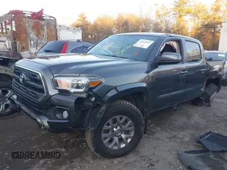2017 Toyota Tacoma SR5 with VIN 3TMCZ5AN4HM104459, listed as a IAAI auction lot 41207997 with 80,103 mi miles and . Bid and sale history available at DreamBid. Image 16.
