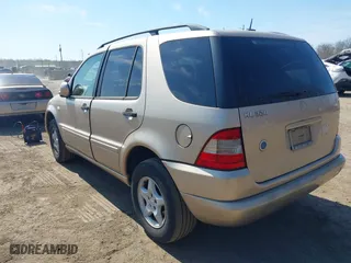 2001 Mercedes-Benz M-Class with VIN 4JGAB54E91A251754, listed as a IAAI auction lot 41784883 with 148,288 mi miles. Bid and sale history available at carsss.com. Image 3.