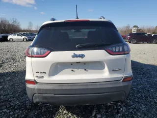 2019 Jeep Cherokee Latitude with VIN 1C4PJMCX0KD125555, listed as a Copart auction lot 48104495 with 115,138 mi miles and Clean Title. Bid and sale history available at carsss.com. Image 6.