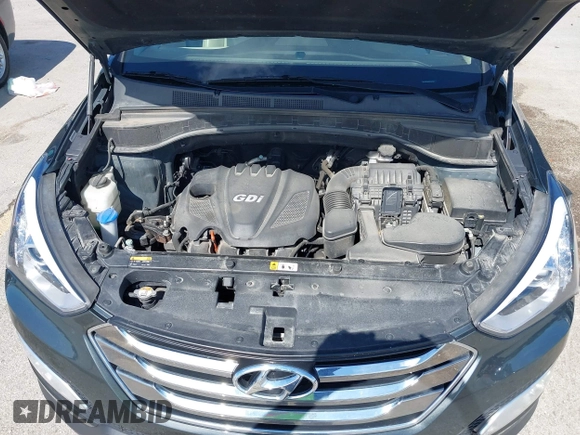 2014 Hyundai Santa Fe with VIN 5XYZUDLB0EG187984, listed as a IAAI auction lot 42607599 with 111,594 mi miles and . Bid and sale history available at DreamBid. Image 10.