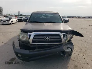 2010 Toyota Tacoma PreRunner with VIN 3TMJU4GN5AM097146, listed as a Copart auction lot 62339915 with 329,044 mi miles and Salvage title. Bid and sale history available at DreamBid. Image 5.