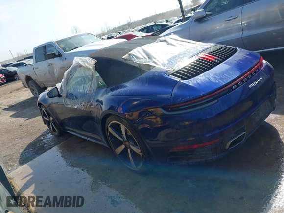 2022 Porsche 911 Carrera with VIN WP0CA2A96NS236957, listed as a IAAI auction lot 41154002 with 34,056 mi miles and . Bid and sale history available at DreamBid. Image 3.
