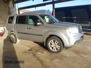 2015 Honda Pilot LX with VIN 5FNYF4H2XFB013573, listed as a IAAI auction lot 41601289 with 103,234 mi miles. Bid and sale history available at carsss.com. Image 1.